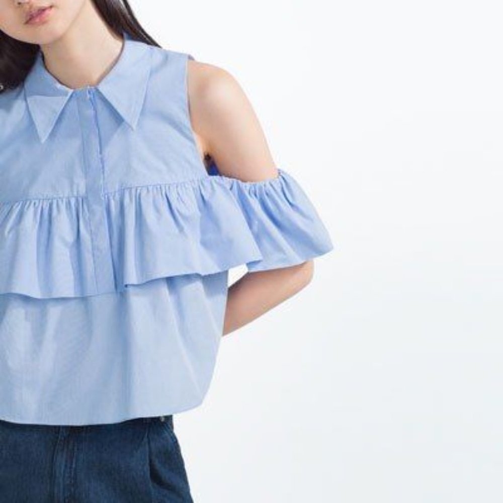 Zara light blue ruffled bottom cold shoulder top